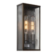 Wall-mounted light fixture with two illuminated bulbs on a white background